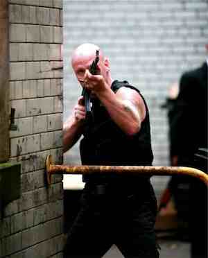 Mission-X-Bald-Guy-Gun-Street.jpg